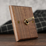 RetroLux Zwart Walnoot 1–4 Gang Wandschakelaar met Messing Toggle