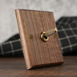 RetroLux Zwart Walnoot 1–4 Gang Wandschakelaar met Messing Toggle